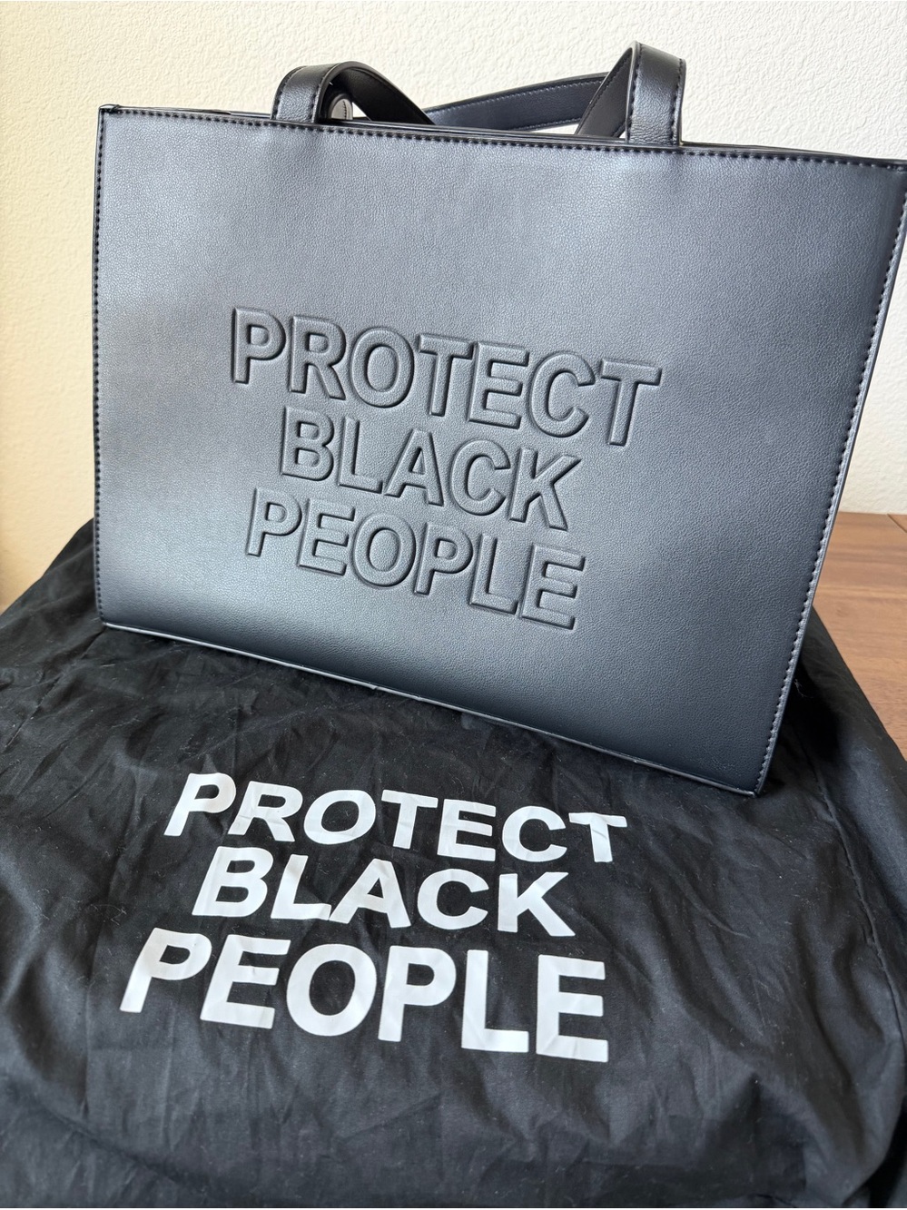Protect Black People Embossed Black Tote Bag